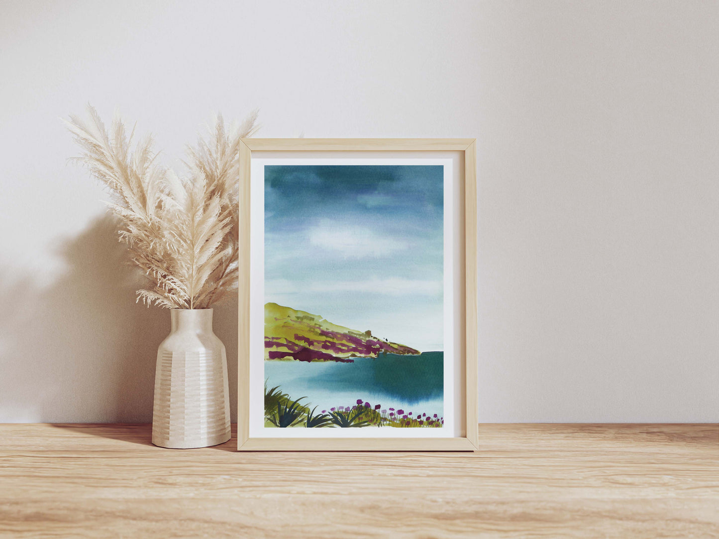 Portrait print in a wooden frame of Rosemullion Head , Cornwal