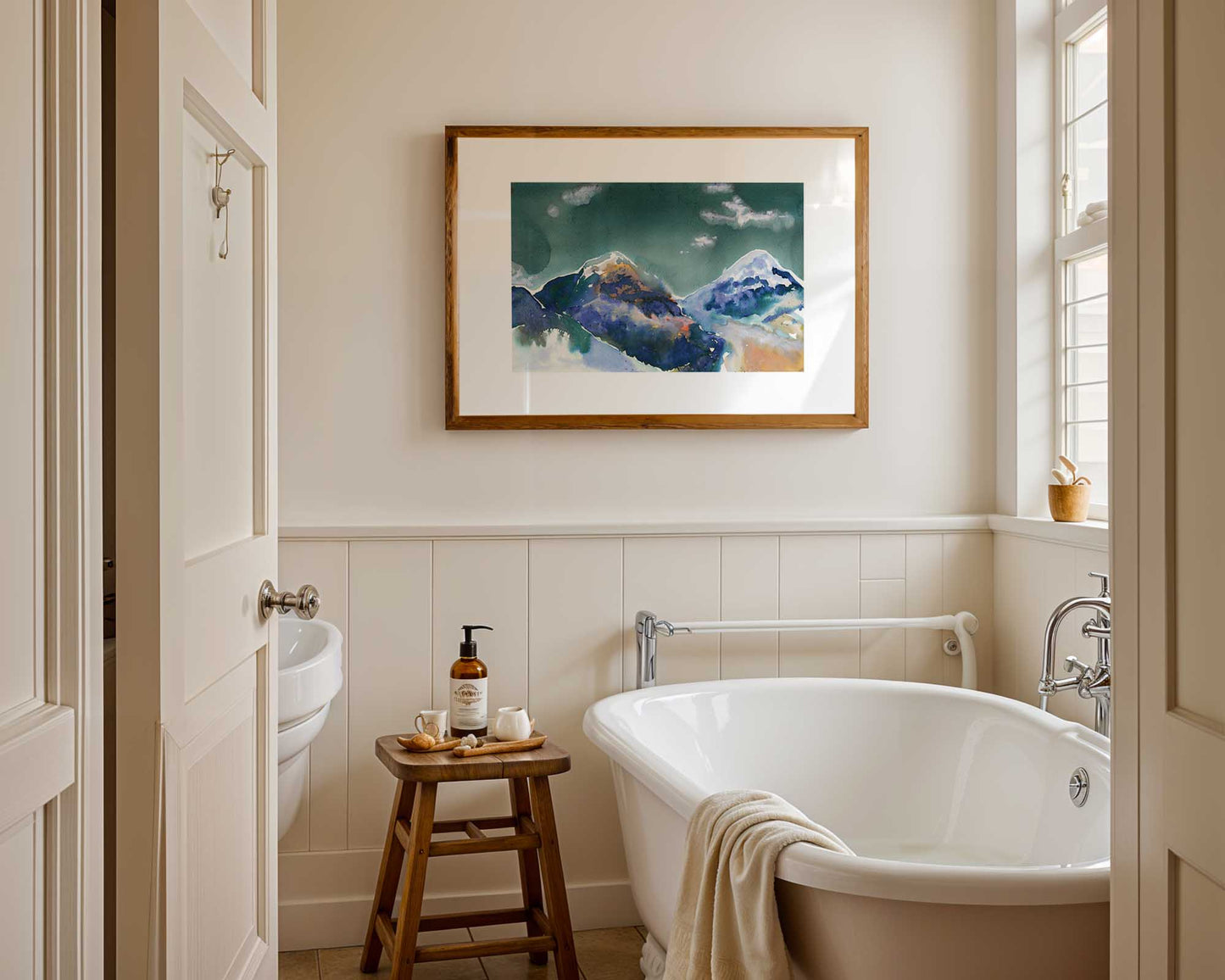 Abstract painting of the Annapurna mountains framed in a bathroom.