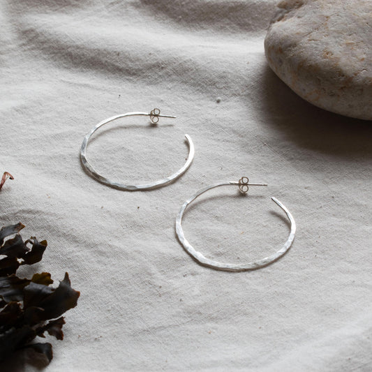 Hammered silver hooped earrings. From Kelpi Studio in Cornwall.