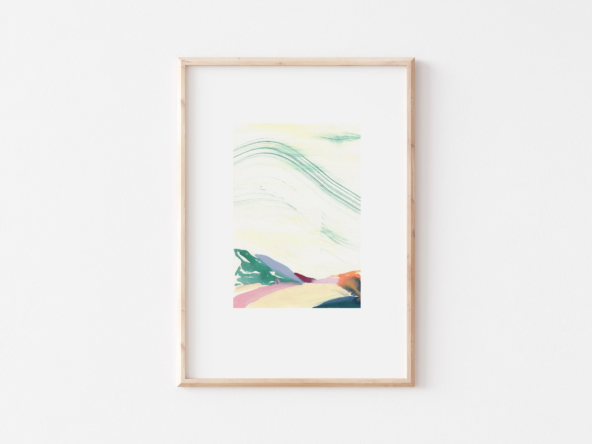Multi-coloured abstract painting of hills in a wooden frame.