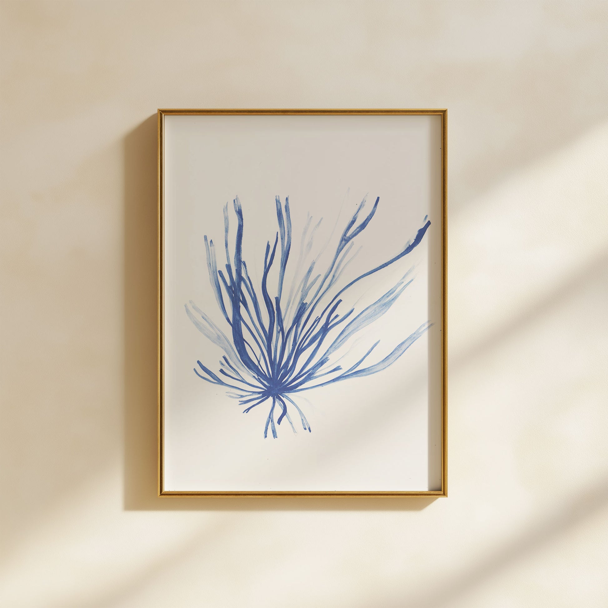 Indigo painting of gut weed / grass kelp in a a4 portrait frame. From Kelpi Studio in Cornwall.