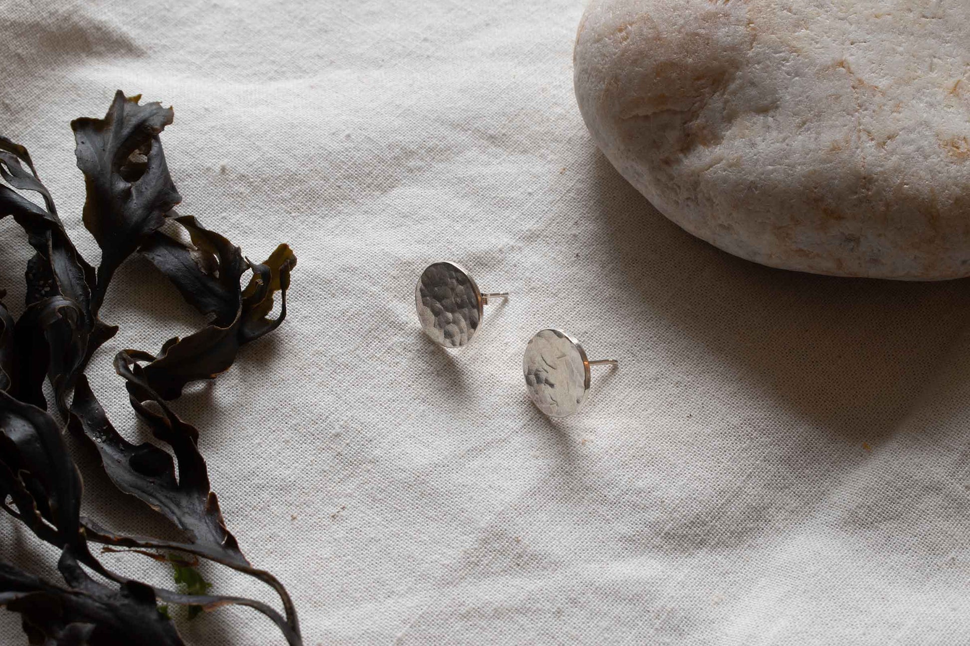 Earring studs made from silver pendants